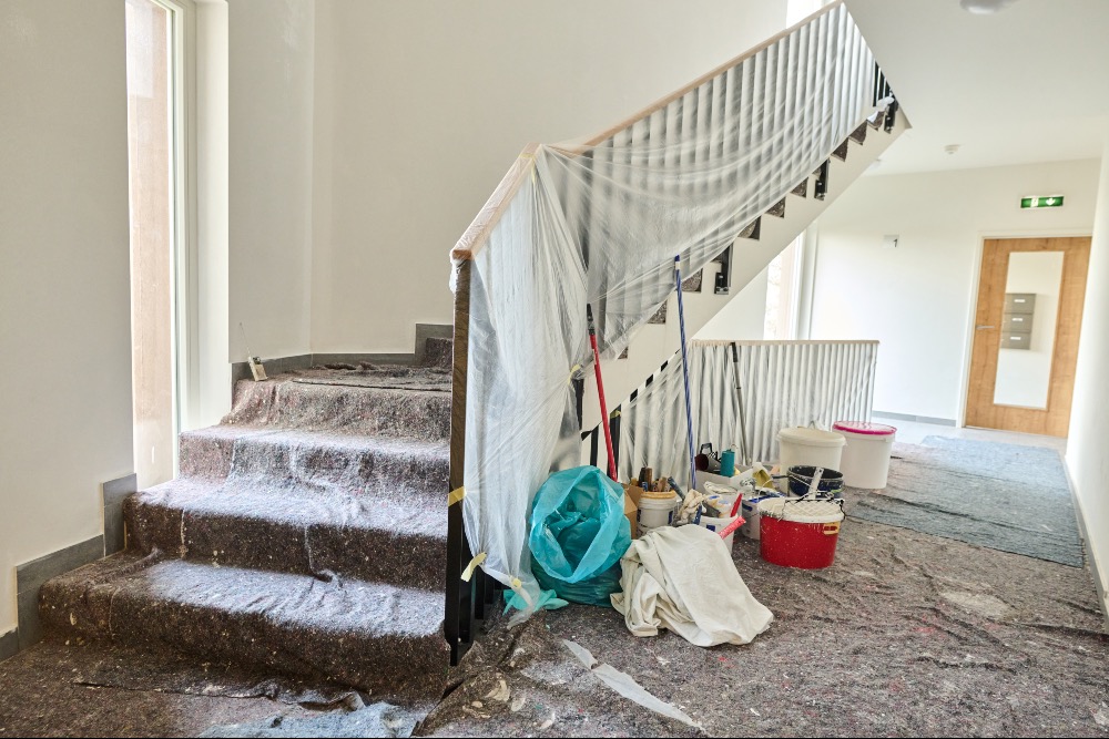 Loose dust sheets on the stairs