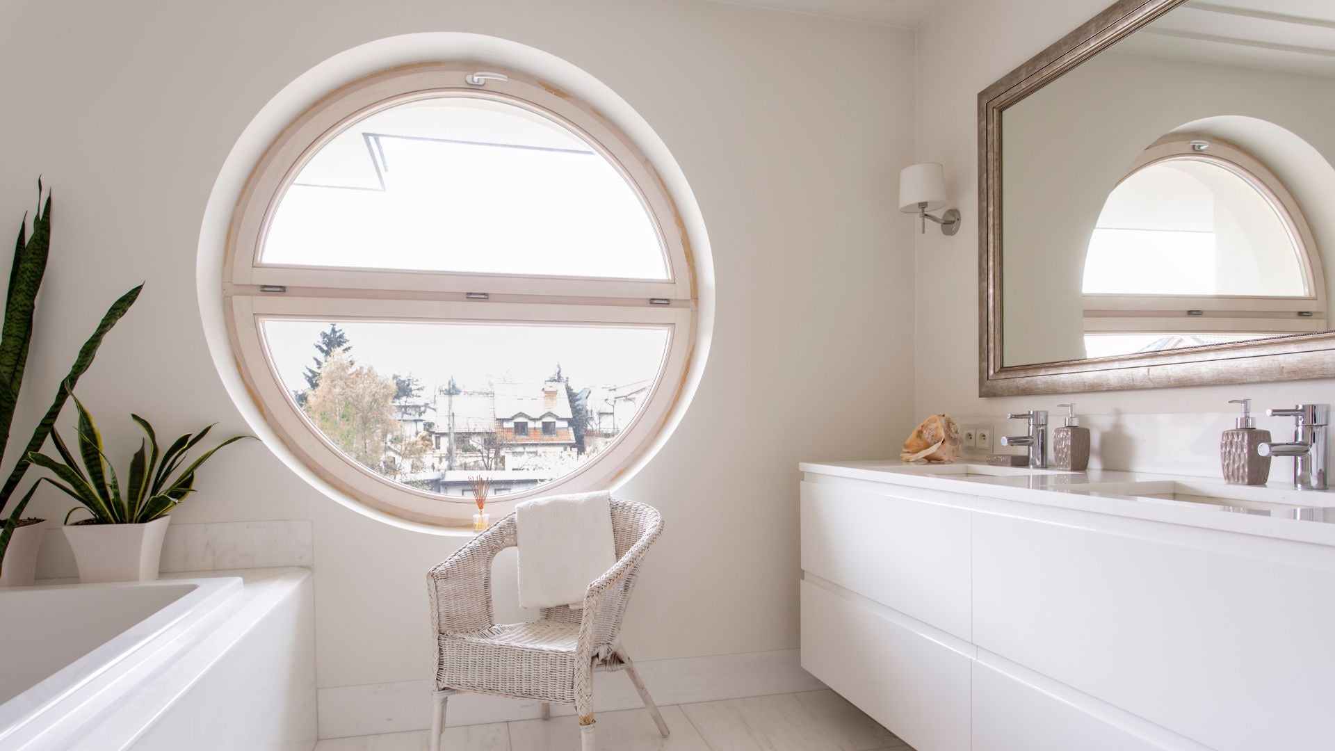luxury-bathroom-3 High quality bathroom with large window and mirrors, white bath, white basins and chrome taps